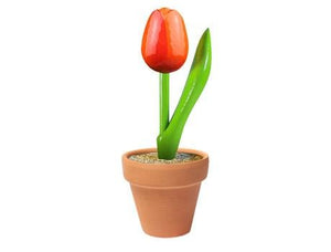 wooden tulip in a pottery jarوردة خشب في اناء فخار